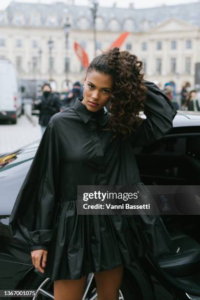 Tina Kunakey poses after the Valentino show in Place Vendome during Paris Fashion Week - Haute Couture Spring/Summer 2022 on January 26, 2022 in...