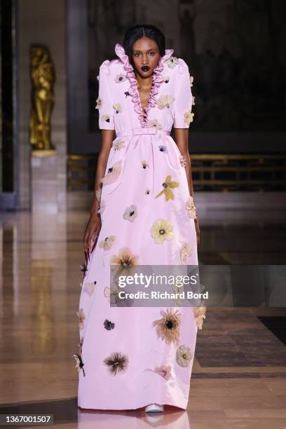 Model walks the runway during the Viktor & Rolf Haute Couture Spring/Summer 2022 show at Palais de Chaillot as part of Paris Fashion Week on January...