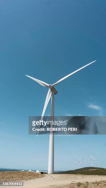 wind turbine in landscape - energia eolica foto e immagini stock