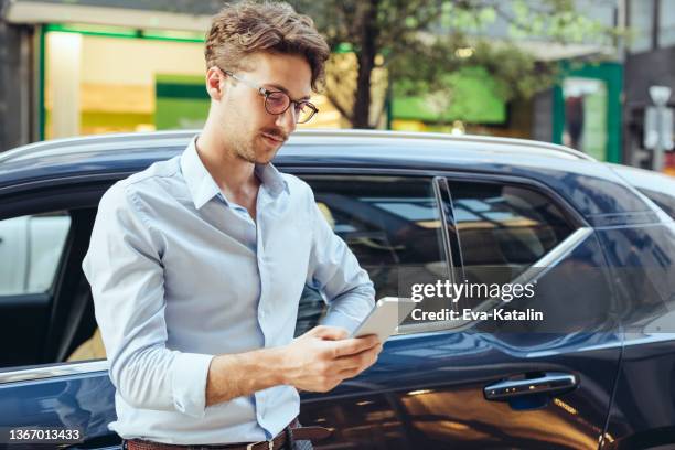 man driving his car - auto insurance stock pictures, royalty-free photos & images