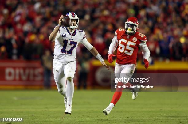 Quarterback Josh Allen of the Buffalo Bills scrambles while being chased by defensive end Frank Clark of the Kansas City Chiefs during the 4th...