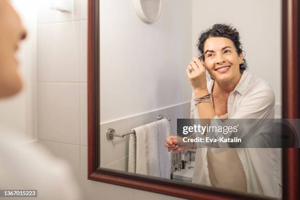 at home - eyebrow pencil stock pictures, royalty-free photos & images