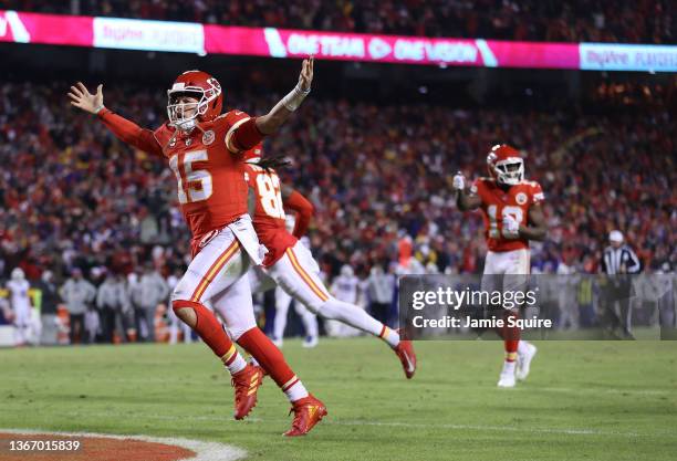 Patrick Mahomes of the Kansas City Chiefs runs toward the end zone while celebrating a touchdown scored by Tyreek Hill during the fourth quarter of...