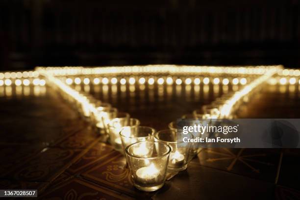 Over 600 candles are arranged in the shape of the Star of David on the floor of the Chapter House of York Minster, lit by members of the congregation...