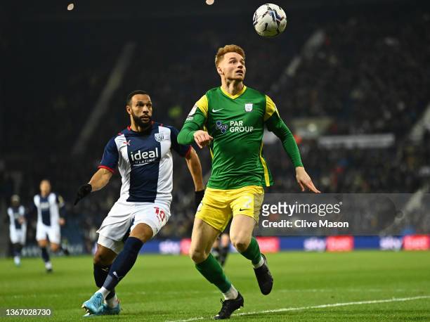 Sepp van den Berg of Preston North End battles for possession with Matt Phillips of West Bromwich Albion during the Sky Bet Championship match...