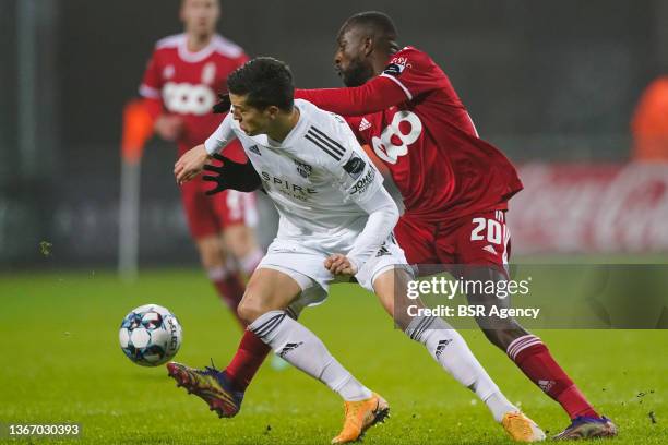 Stef Peeters of KAS Eupen battles for the ball with Merveille Bokadi Bope of Standard de Liege during the Jupiler Pro League match between KAS Eupen...