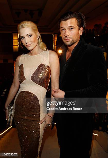 Sarah Kern and Goran Munizaba attend the fashion show 'Gloeoeckler presented by bonprix' collection launch at FELIX club on January 10, 2012 in...