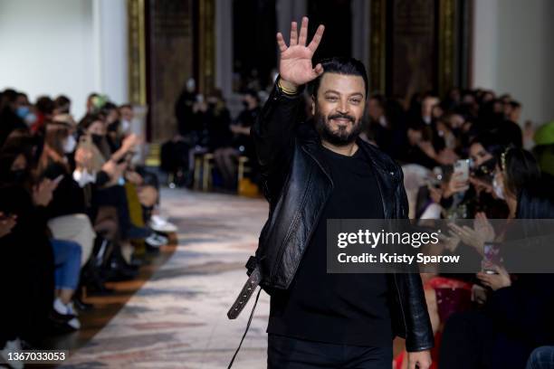 Designer Zuhair Murad acknowledges the crowd during the Zuhair Murad Haute Couture Spring/Summer 2022 show as part of Paris Fashion Week on January...