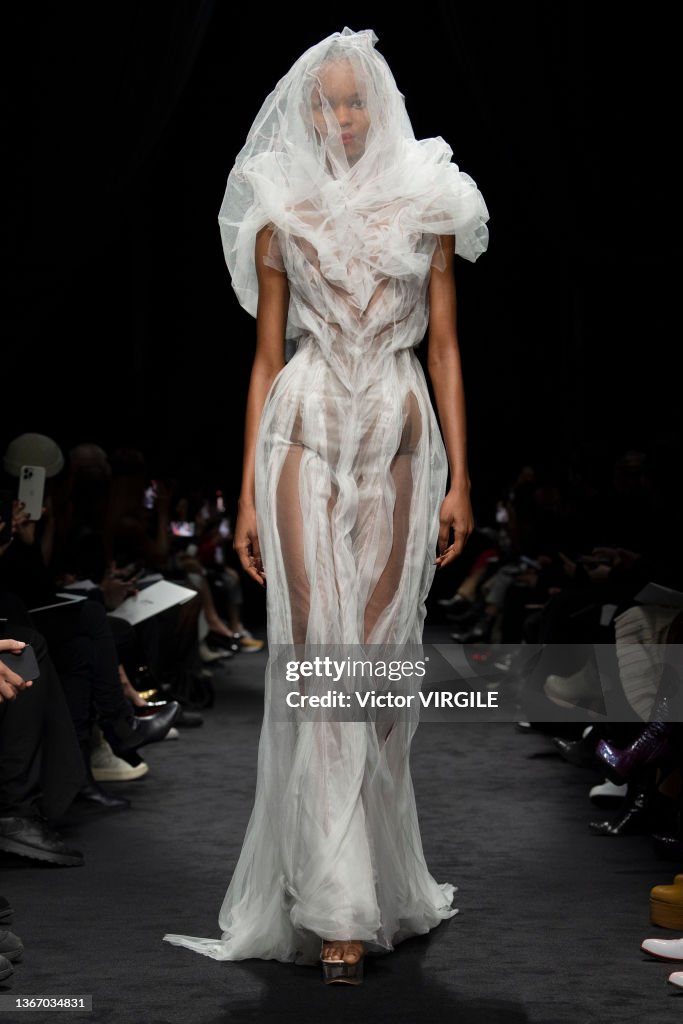 A model walks the runway during the Jean Paul Gaultier by Glenn