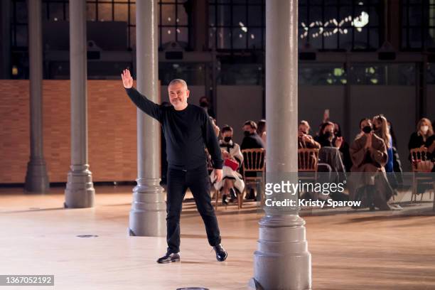 Designer Elie Saab acknowledges the audience during the Elie Saab Haute Couture Spring/Summer 2022 show as part of Paris Fashion Week on January 26,...