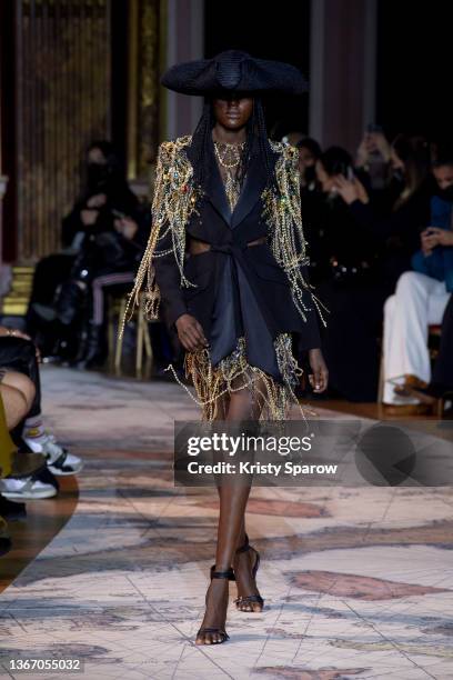Model walks the runway during the Zuhair Murad Haute Couture Spring/Summer 2022 show as part of Paris Fashion Week on January 26, 2022 in Paris,...