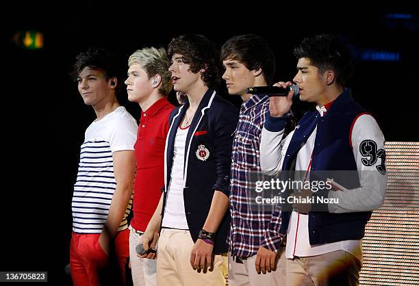 Louis Tomlinson, Niall Horan, Harry Styles, Liam Payne and Zayn Malik of One Direction perform at Hammersmith Apollo on January 10, 2012 in London,...