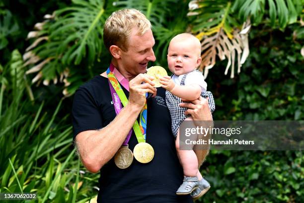 New Zealand Rower Hamish Bond poses for a photo with his son Finlay Bond following his retirement announcement at the NZOC offices on January 27,...