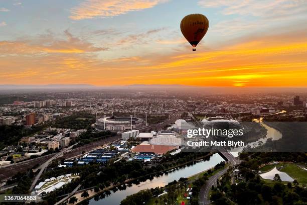 Hot air balloon is seen over the Melbourne Cricket Ground, Melbourne Park, AAMI Park and the Yarra River taken from a hot air balloon on January 24,...