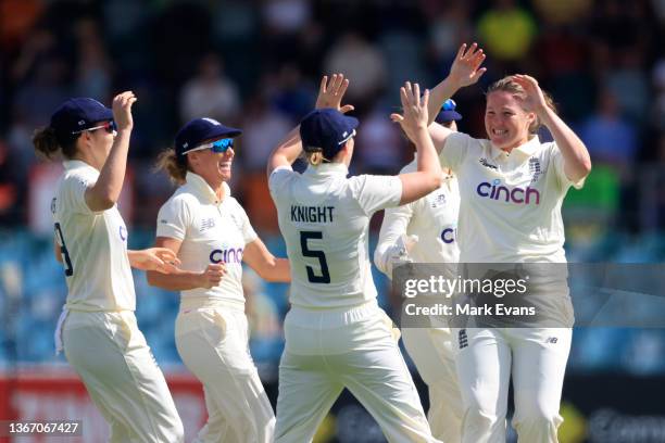 Anya Shrubsole of England celebrates the wicket of Beth Mooney of Australia during day one of the Women's Test match in the Ashes series between...