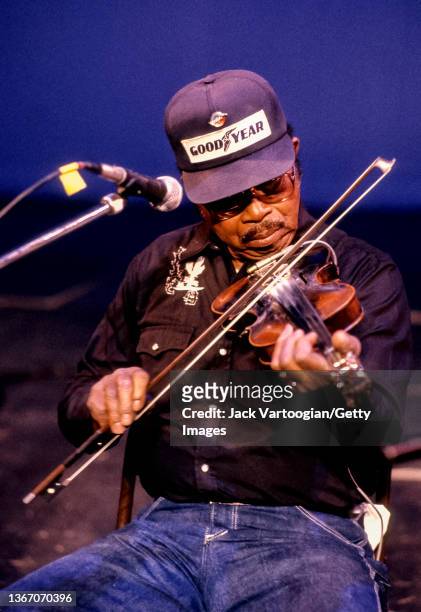 American Folk and String Band musician Joe Thompson plays fiddle as he performs during the World Music Institute Winter Blues Festival at the Borough...