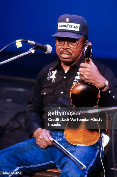 American Folk and String Band musician Joe Thompson plays fiddle as he performs during the World Music Institute Winter Blues Festival at the Borough...
