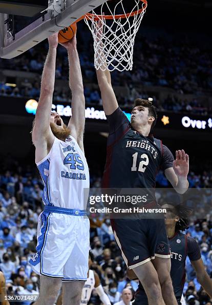 Quinten Post Of The Boston College Eagles Defends Against Brady Manek