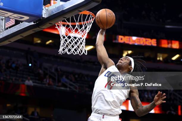 Terance Mann of the LA Clippers slams the ball during the third quarter against the Orlando Magic at Amway Center on January 26, 2022 in Orlando,...