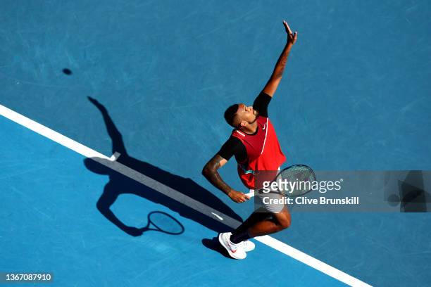 Nick Kyrgios of Australia serves in his Men's Doubles Semifinals match with Thanasi Kokkinakis of Australia against Marcel Granollers of Spain and...