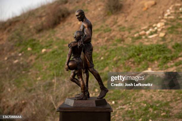 Artist Dan Medina's bronze sculpture depicting Kobe Bryant, daughter Gianna Bryant, and the names of those who died in a helicopter crash in 2020 is...