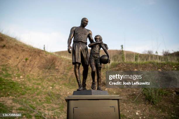 Artist Dan Medina's bronze sculpture depicting Kobe Bryant, daughter Gianna Bryant, and the names of those who died in a helicopter crash in 2020 is...