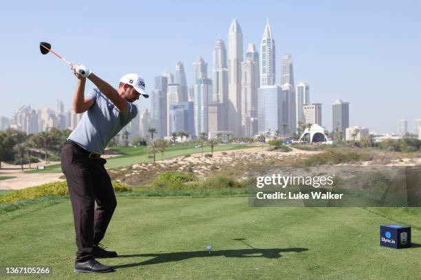 Scott Jamieson of Scotland plays his tee shot on the eighth hole during day one of the Slync.io Dubai Desert Classic at Emirates Golf Club on January...