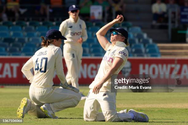 Heather Knight of England reacts after a dropped catch during day one of the Women's Test match in the Ashes series between Australia and England at...