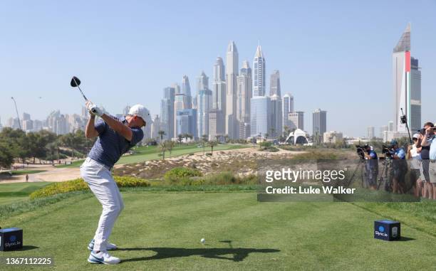 Rory McIlroy of Northern Ireland plays his tee shot on the eighth hole during day one of the Slync.io Dubai Desert Classic at Emirates Golf Club on...