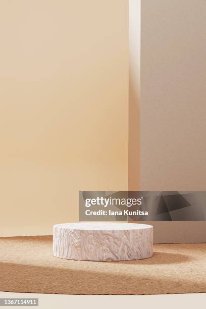 beige podium on brown background. stand for various products. 3d template. trendy natural colors. - podium mode stock-fotos und bilder