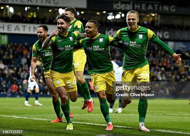 Cameron Archer of Preston North End celebrates with teammates Greg Cunningham and Brad Potts of Preston North End after scoring their team's second...