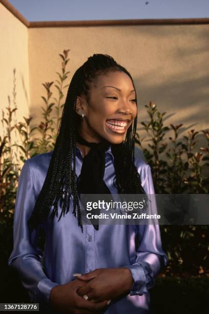 American singer, songwriter, and actress Brandy attends the 1996 MTV Movie Awards, held at Walt Disney Studios in Burbank, California, 8th June 1996.