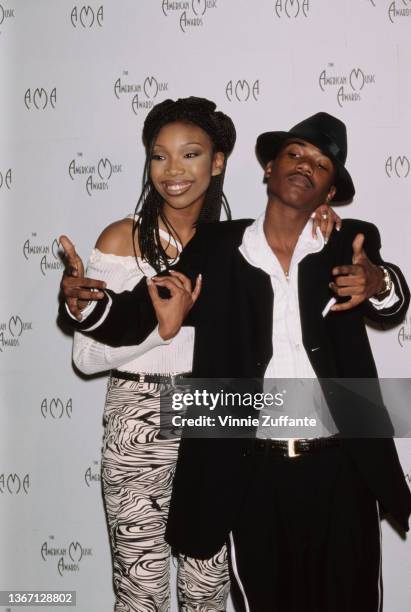 American singer, songwriter, and actress Brandy and her brother, American singer, songwriter, and actor Ray J attend the 24th Annual American Music...