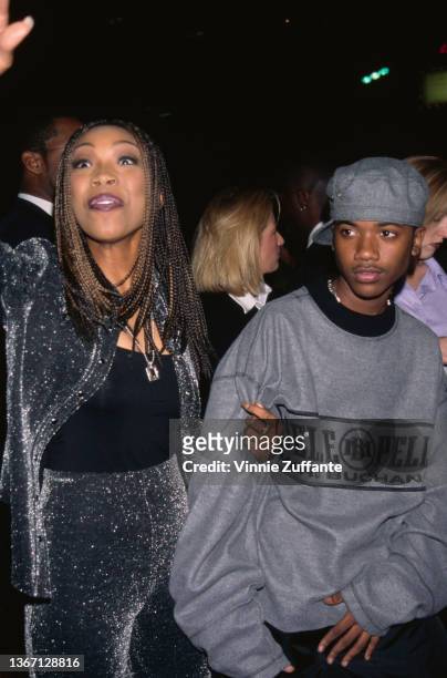 American singer, songwriter, and actress Brandy and her brother, American singer, songwriter, and actor Ray J attend the Hollywood premiere of 'Set...