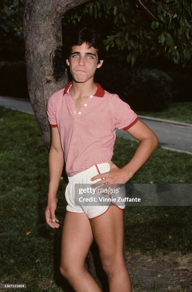 American actor Brian Bloom, wearing a redandwhite striped polo