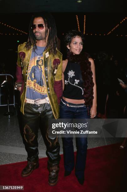 American singer-songwriter Eric Benet and his wife, American actress Halle Berry attend the Century City premiere of 'The Brothers,' held at Loews...