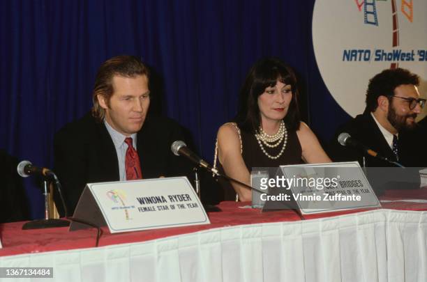 American actor Jeff Bridges and American actress Anjelica Huston attend the 1990 NATO/ShoWest Convention, held at Bally's Hotel & Casino in Las...