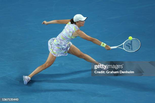 Iga Swiatek of Poland plays a backhand in her Women's Singles Semifinals match against Danielle Collins of United States during day 11 of the 2022...