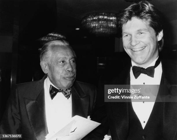 American bandleader and singer Cab Calloway and American actor Jeff Bridges attend the 29th Annual Thalians Ball, held at the Century Plaza Hotel in...