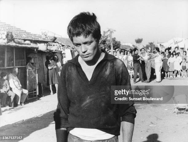 Italian actor Franco Citti on the set of the film "Accatone" directed by Pier Paolo Pasolini.