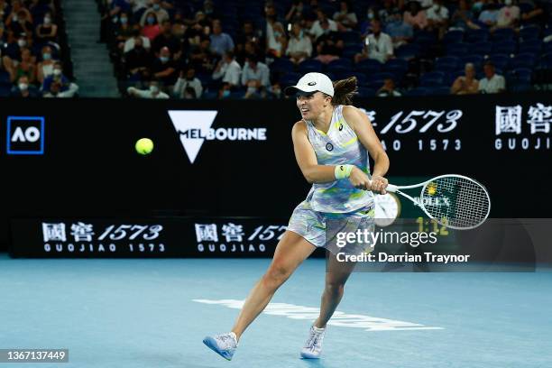 Iga Swiatek of Poland plays a backhand in her Women's Singles Semifinals match against Danielle Collins of United States during day 11 of the 2022...