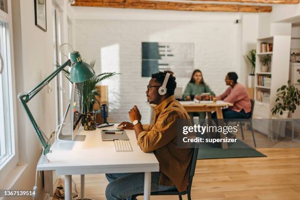 Normal People Using Tech Young People Use Technology Indoor High-Res Stock Photo - Getty Images