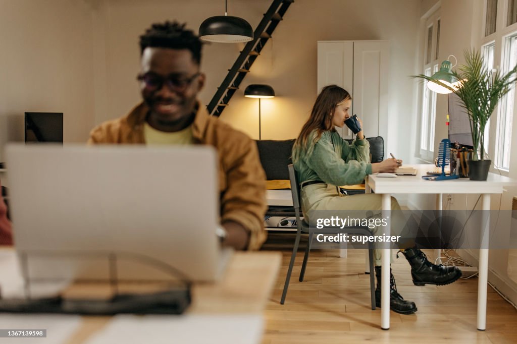 Normal People Using Tech Young People Use Technology Indoor High-Res Stock Photo - Getty Images
