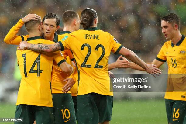 Craig Goodwin of Australia and Riley McGree of Australia celebrate with team mates during the FIFA World Cup Qatar 2022 AFC Asian Qualifier match...