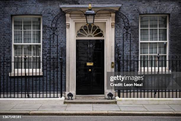 Generalview of the door of number 10, Downing Street on January 27, 2022 in London, England. On Tuesday, the Met Police announced an investigation...