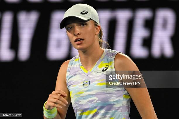 Iga Sviatek of Poland celebrates during her match against Danielle Collins of the United States during day 11 of the 2022 Australian Open at...