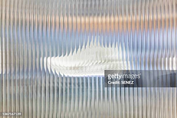 white shoes of seen through textured glass - glassy stock pictures, royalty-free photos & images