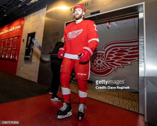 Michael Rasmussen of the Detroit Red Wings heads out to the ice for warm ups before an NHL game against the Chicago Blackhawks at Little Caesars...