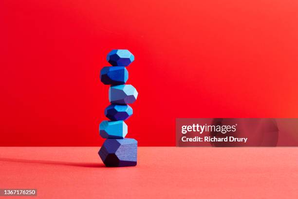 conceptual image of geometric pebbles - stability stockfoto's en -beelden