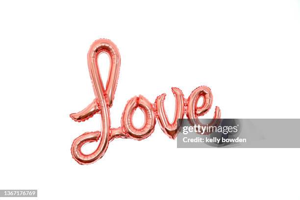 love word balloon rose gold valentines day - helium balloon stock pictures, royalty-free photos & images